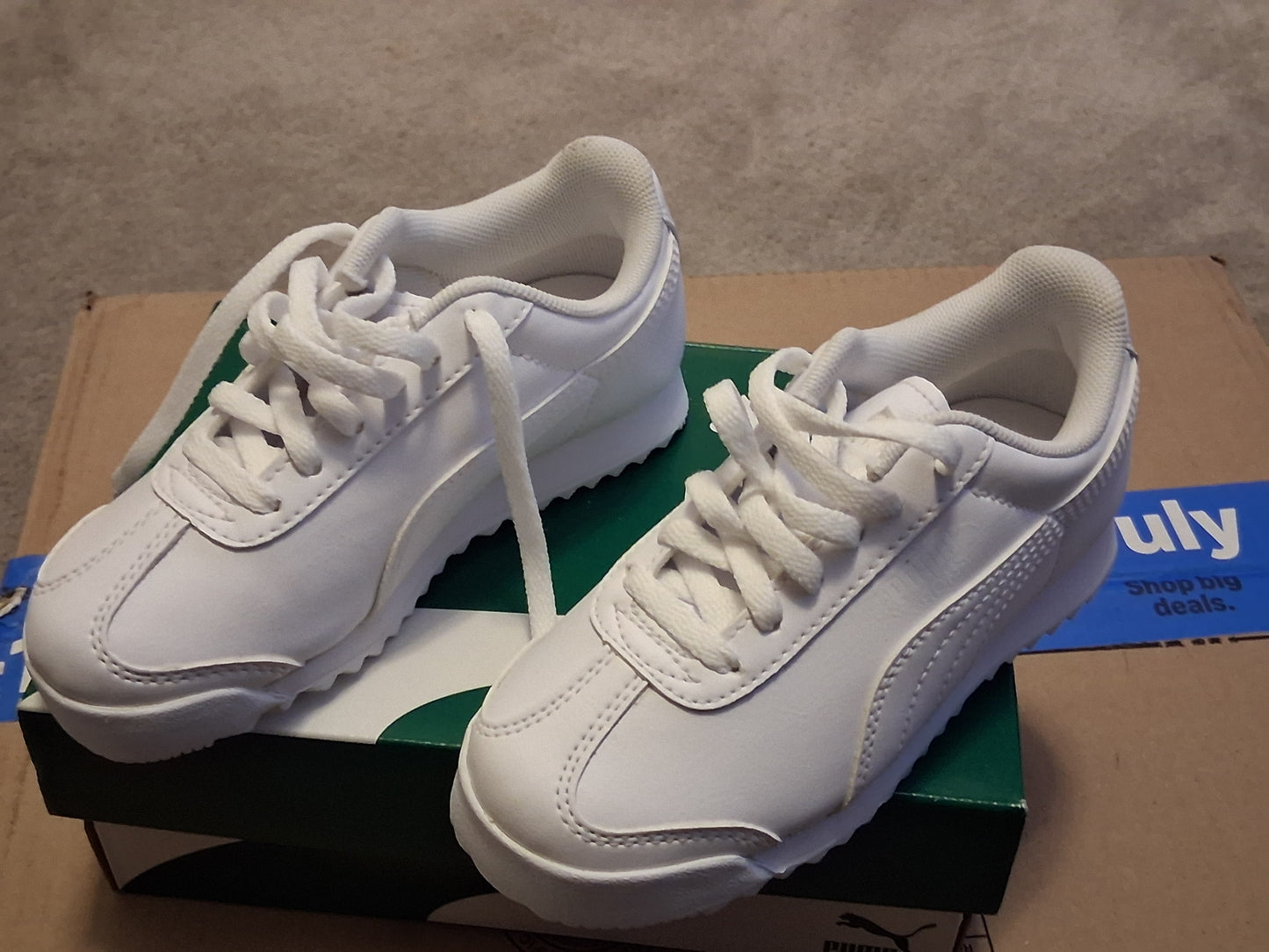 Kids White PUMA sneakers