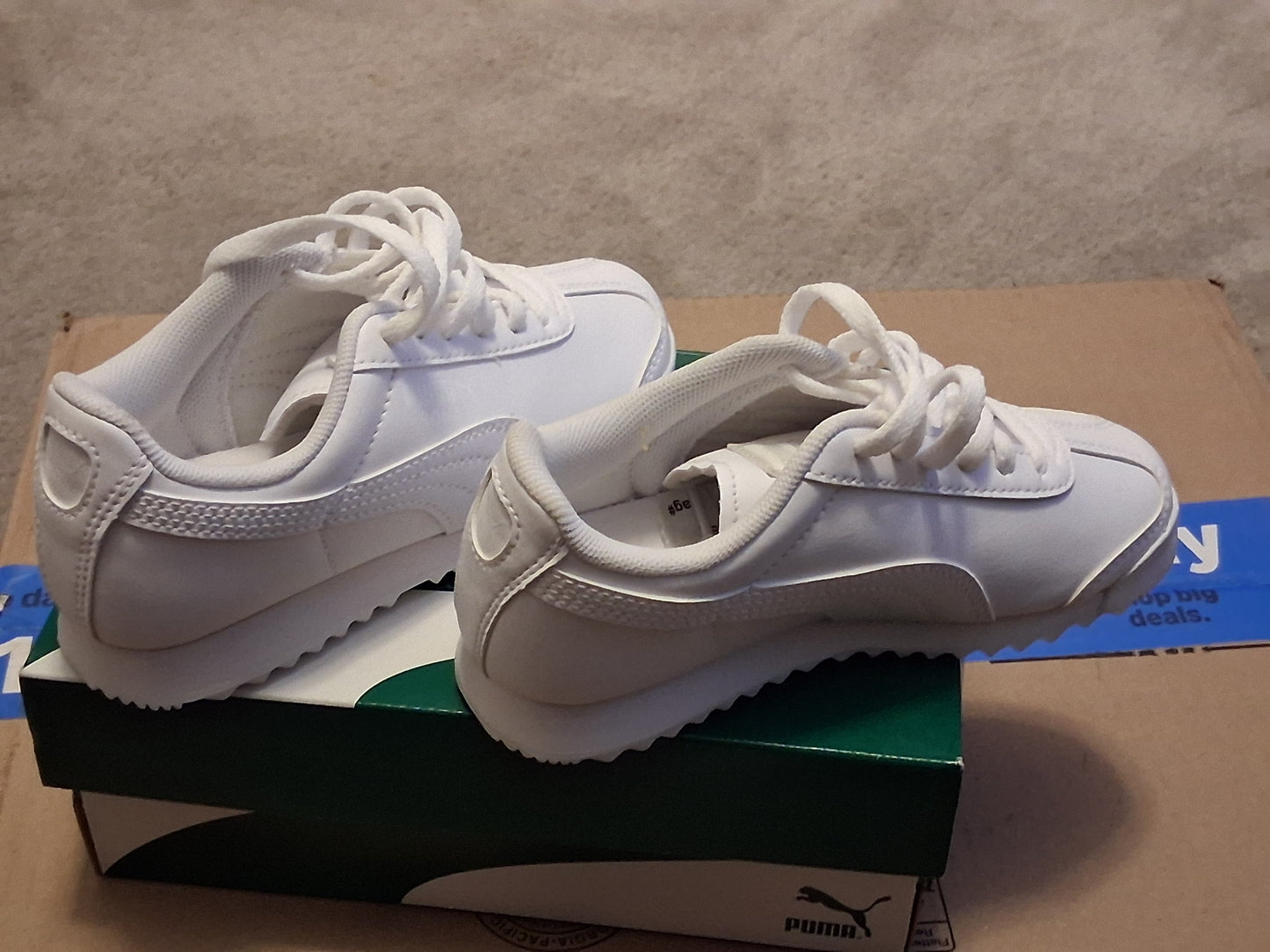 Kids White PUMA sneakers