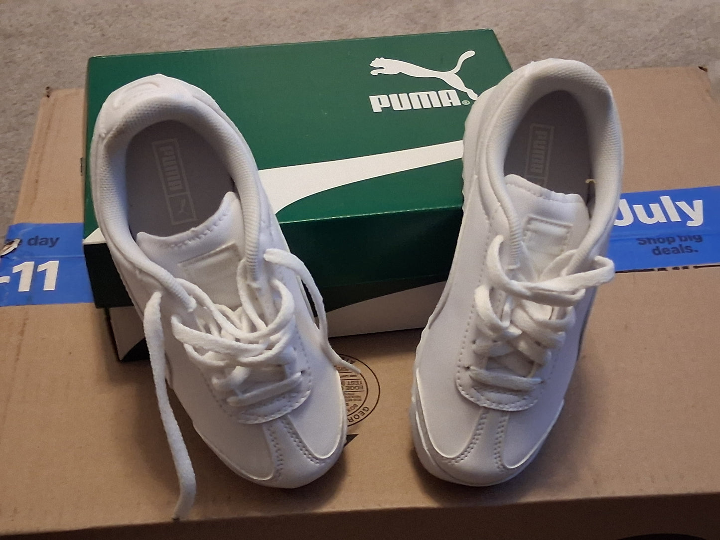 Kids White PUMA sneakers