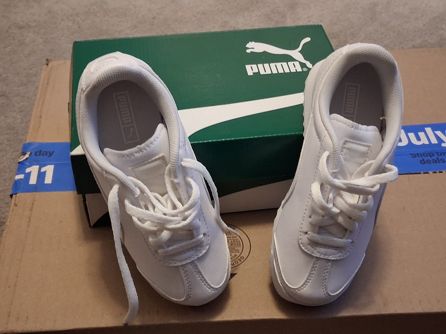Kids White PUMA sneakers